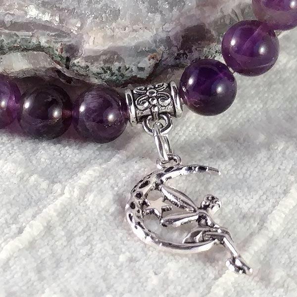 Amethyst 8mm beaded stretch bracelet with Fairy on Moon charm