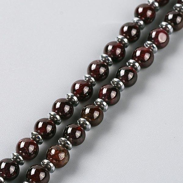 Garnet necklace with chkara beads and wrapped quartz focal pendant