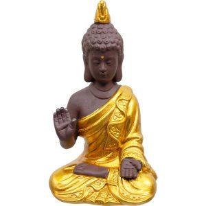 Gold Buddha statue sitting in Abhaya Mudra pose