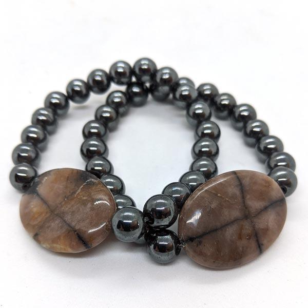 Large Chiastolite center bead with 8mm Hematite beads in a stretchy bracelet
