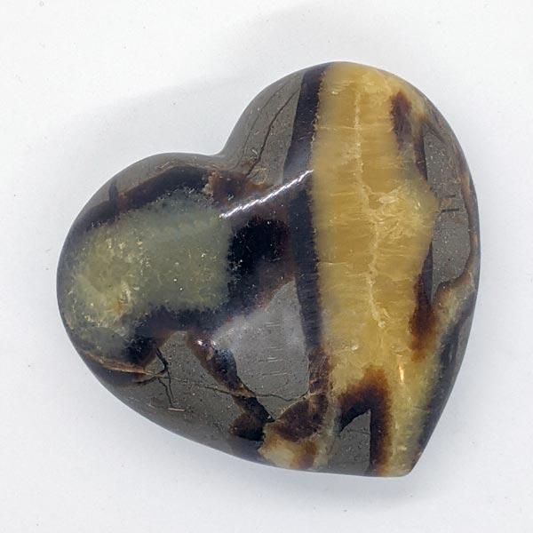 Carved and polished large Separian Heart Palm Stone